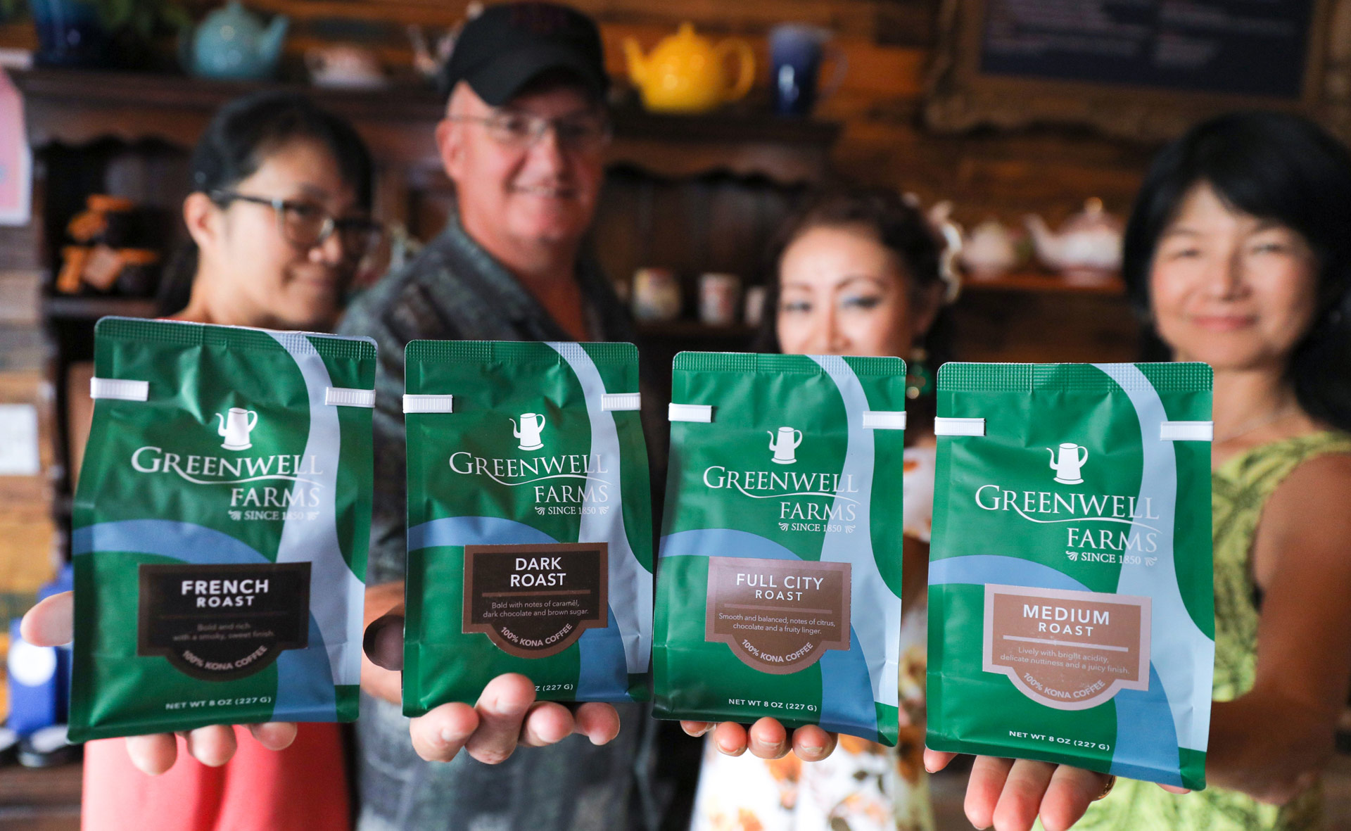 Greenwell Farms Team Showing Their Kona Coffee